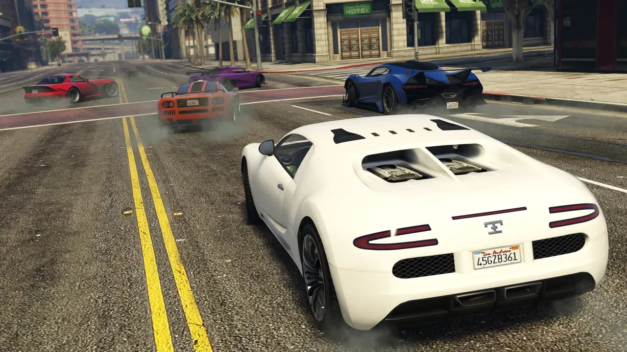 Official Rockstar image of a white Truffade Adder seen from behind, racing other supercars down a downtown street