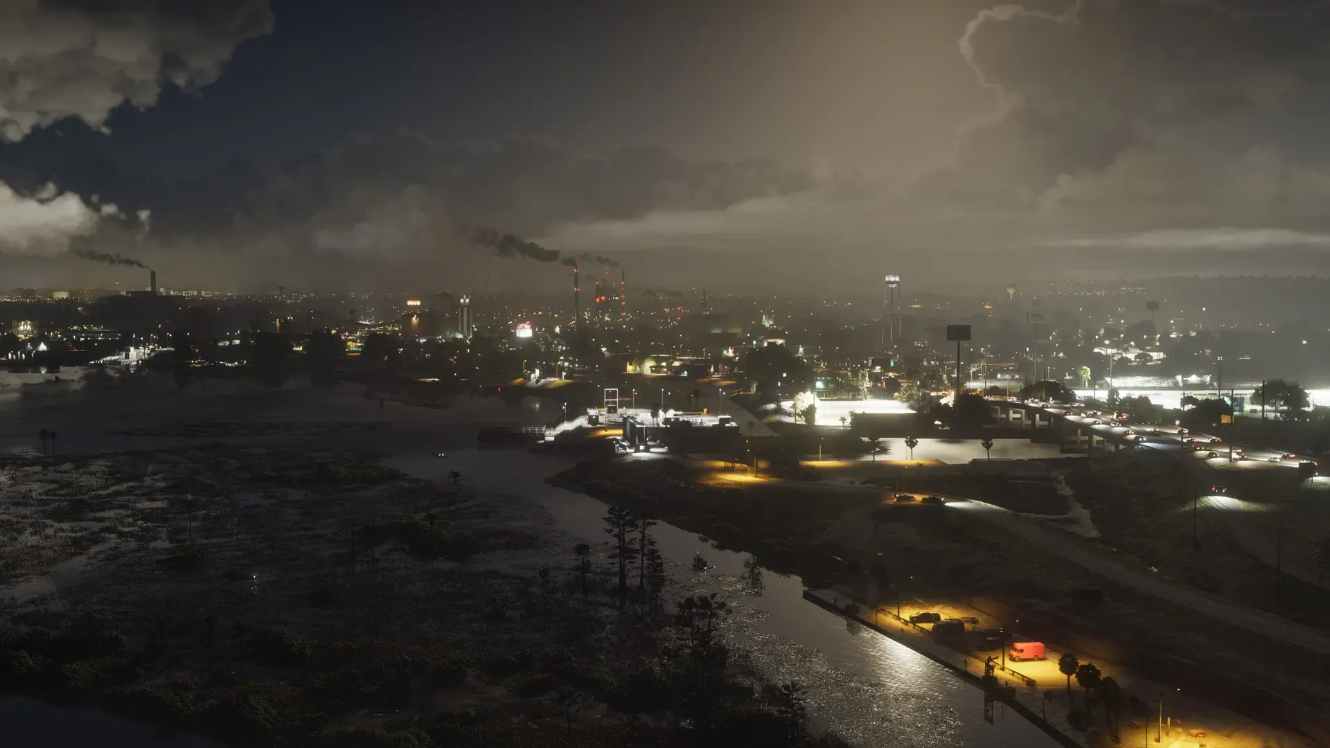 The Ambrosia skyline at night featuring smoke stacks in the distance.