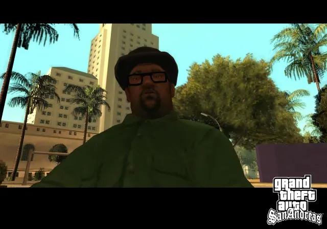 Original game: Big Smoke, in his glasses and dark cap, looks into the camera under palm trees and tall buildings in Idlewood