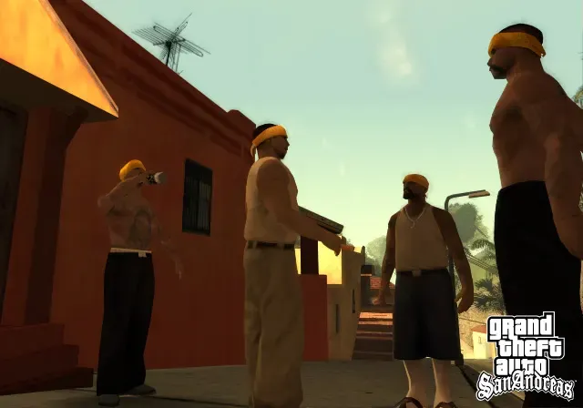 Original game: four men in yellow bandanas stand around in the low sun between houses in East Los Santos