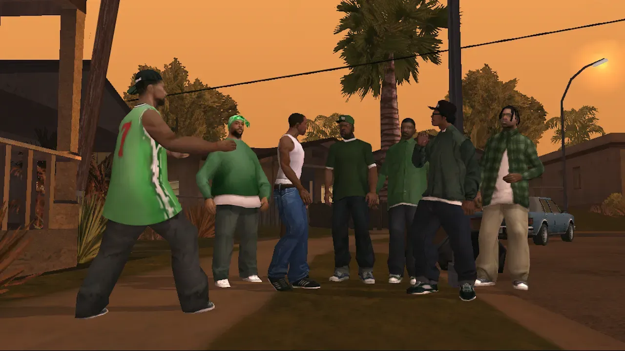 Original game, 2013 mobile release: CJ and a group of Grove Street members in green gather on a residential street at sunset