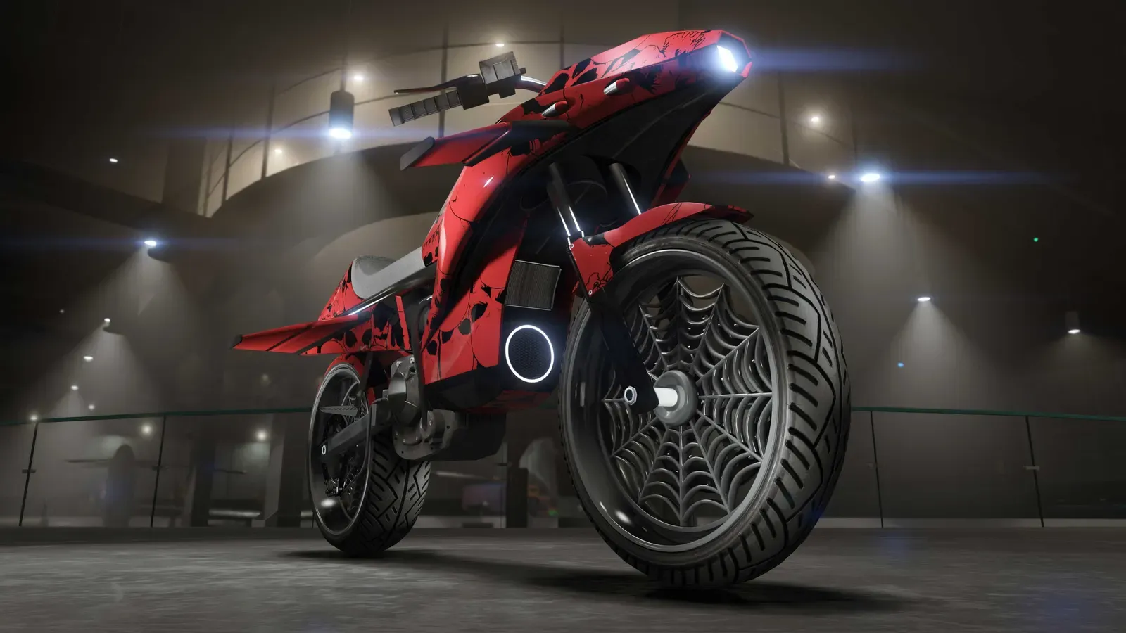 The Pegassi Oppressor motorcycle in a red skull livery with spiderweb wheels