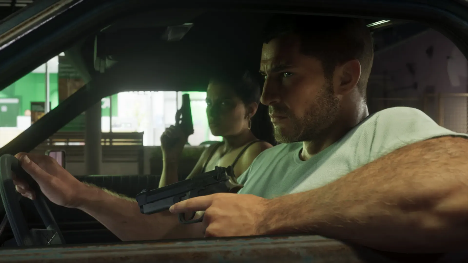 Jason driving with a pistol in his hand while Lucia sits beside him holding a gun.
