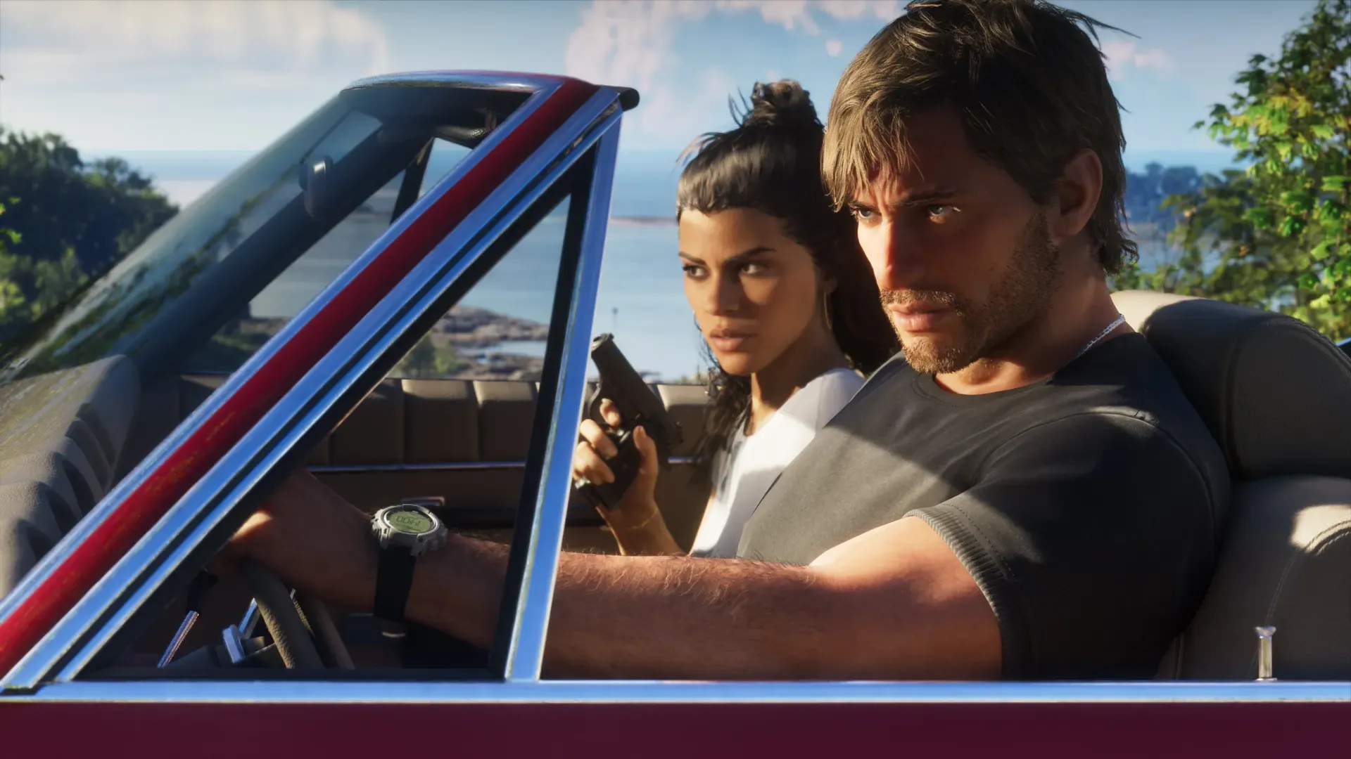 Jason drives a red convertible while Lucia sits next to him holding a pistol.