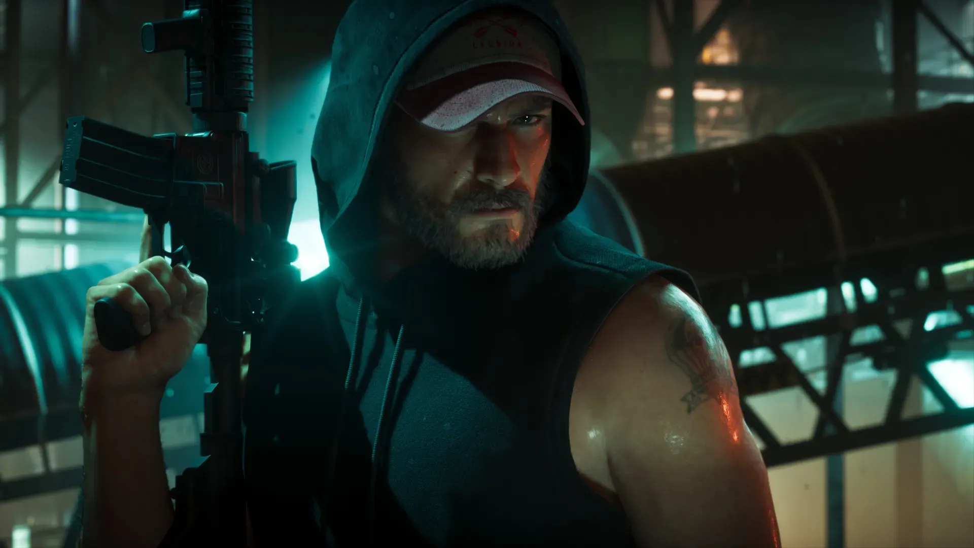 Jason in a hood and cap holding a rifle in a dark industrial building.
