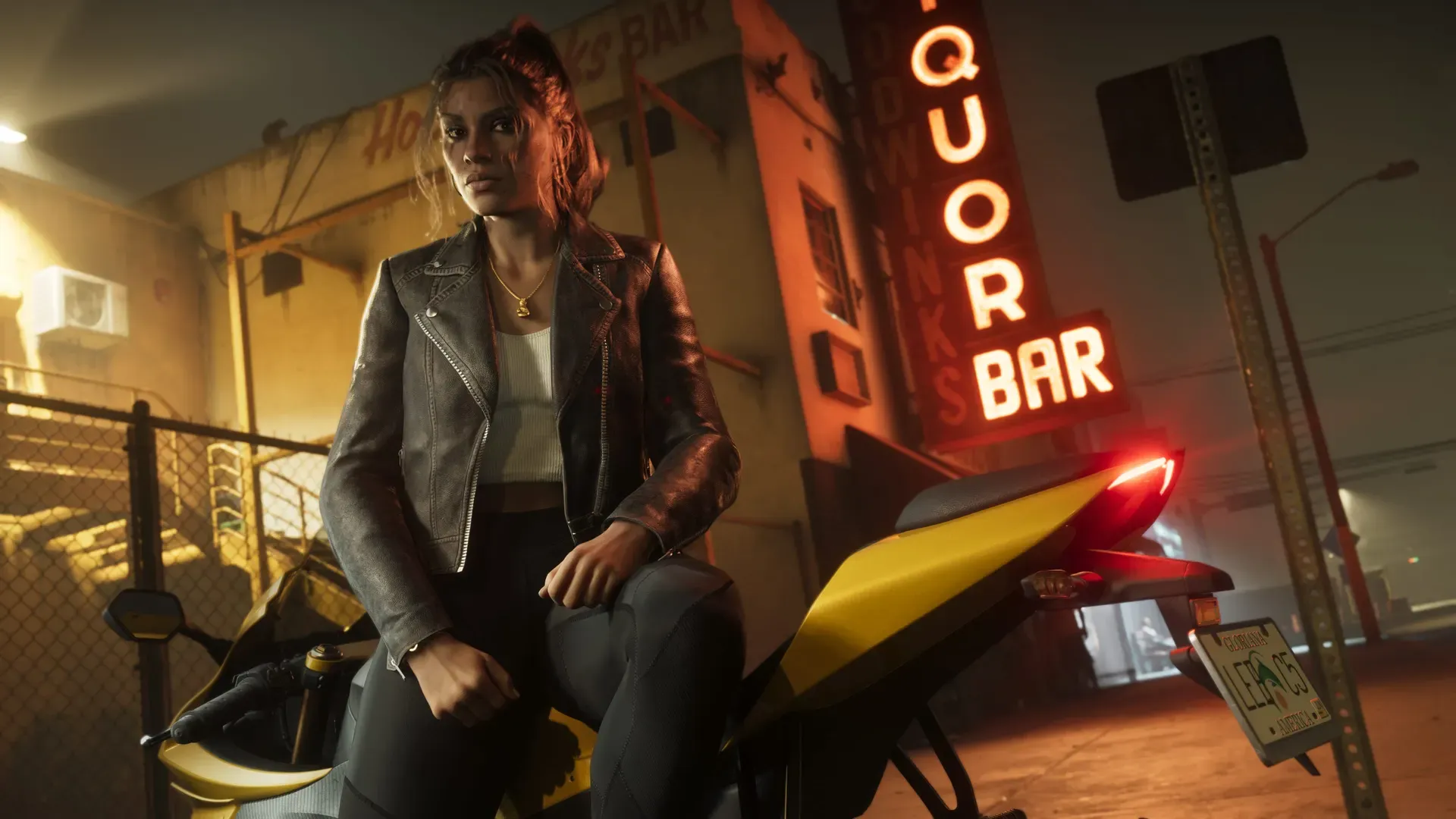 Lucia on a yellow motorcycle outside a neon bar