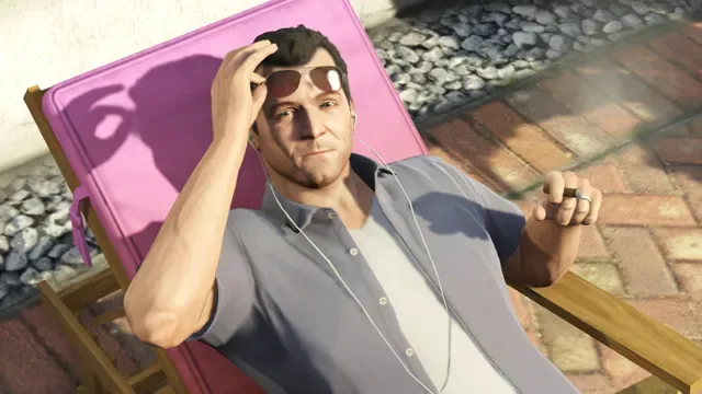 Michael lounges on a sun bed with earphones, lifting his sunglasses