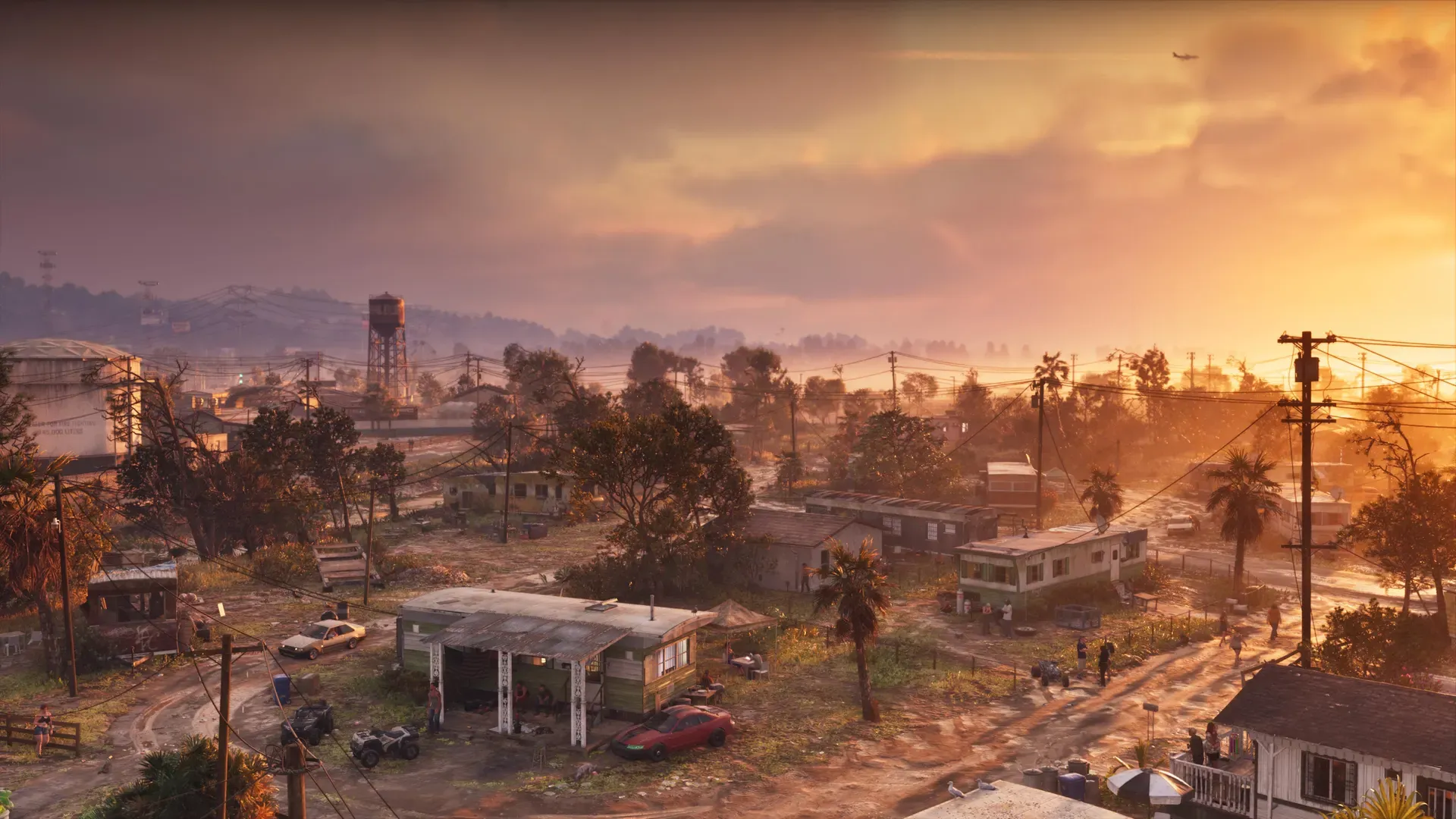 Port Gellhorn's streets and low buildings seen from above at sunset.