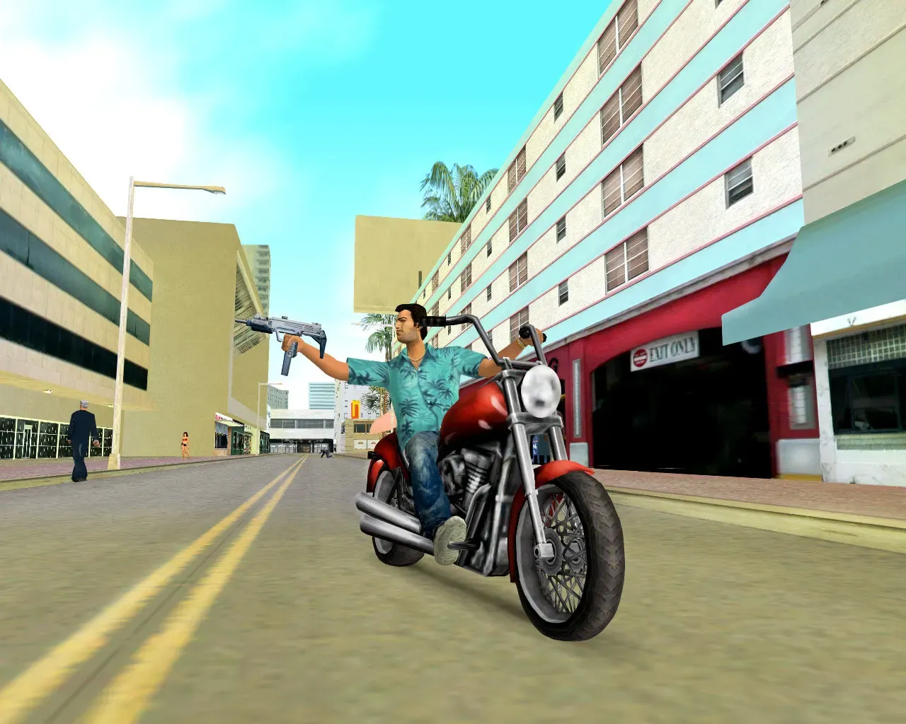 Tommy rides a red chopper motorbike down a street of pastel apartment blocks, aiming a submachine gun to the side