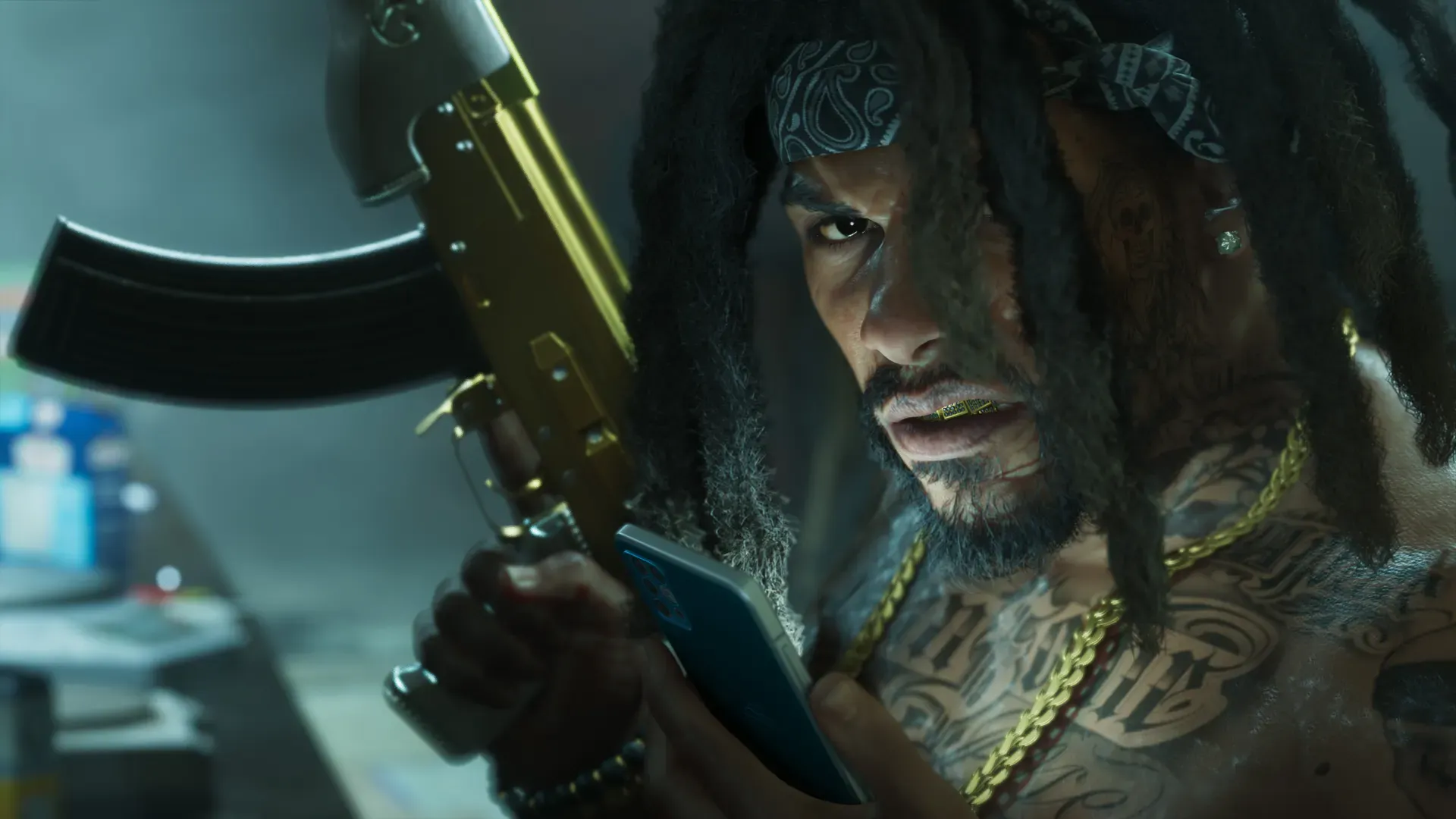 A tattooed man with dreadlocks holding a gold rifle and a phone.